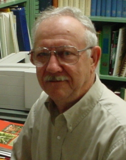Holcomb, Gordon E.