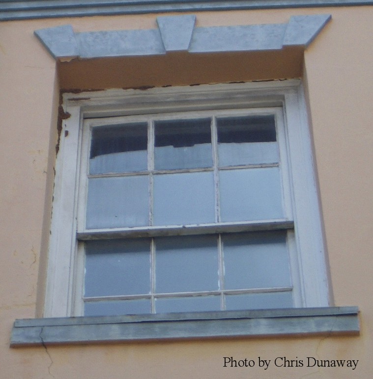 Termite swarm castles in window frame