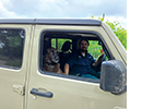 Man in a jeep.