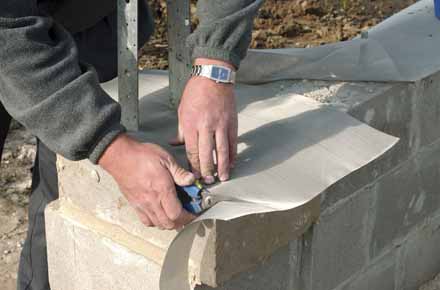 Steel mesh between cement foundations and wood sill plates