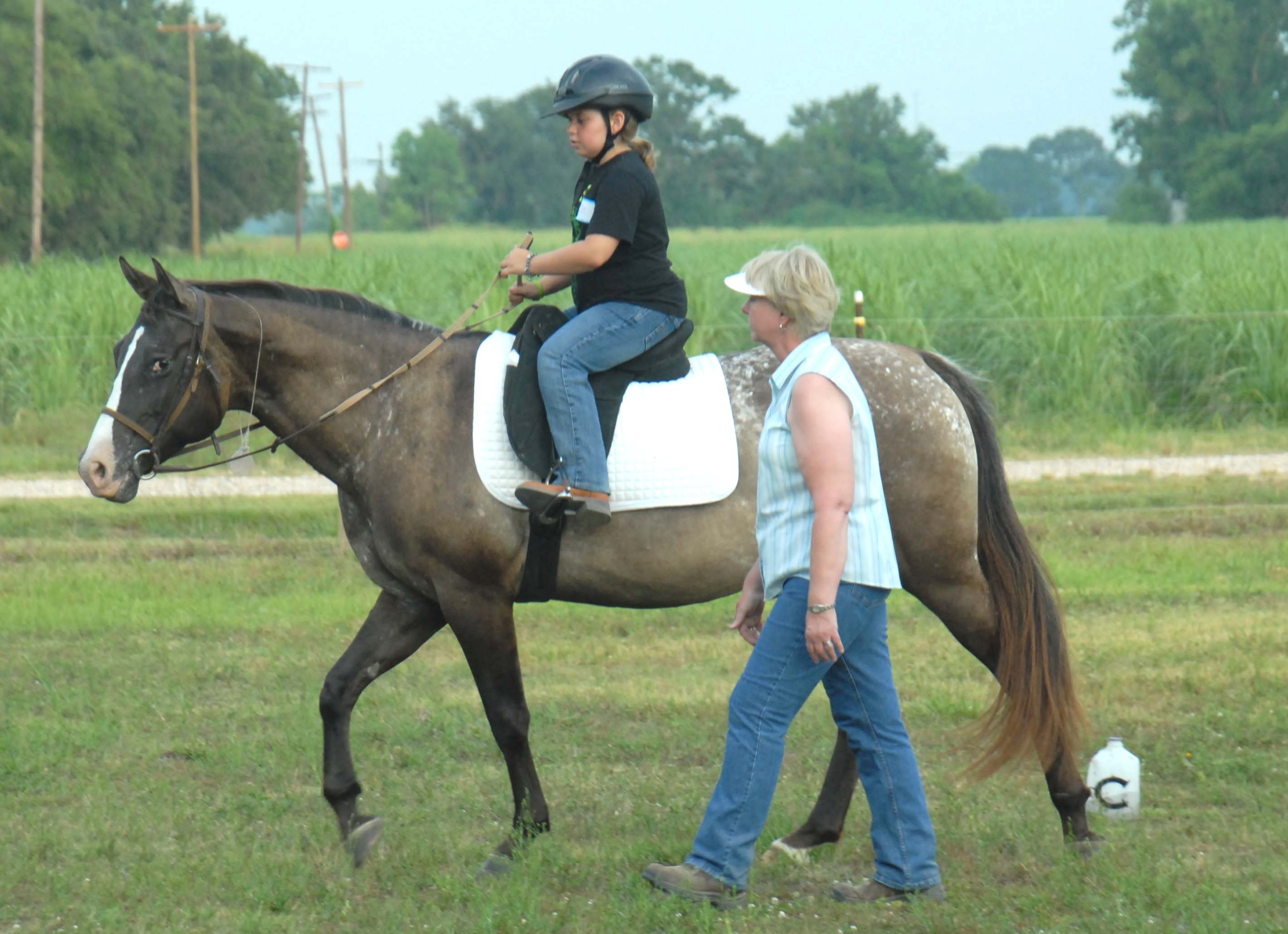 student learning to ride