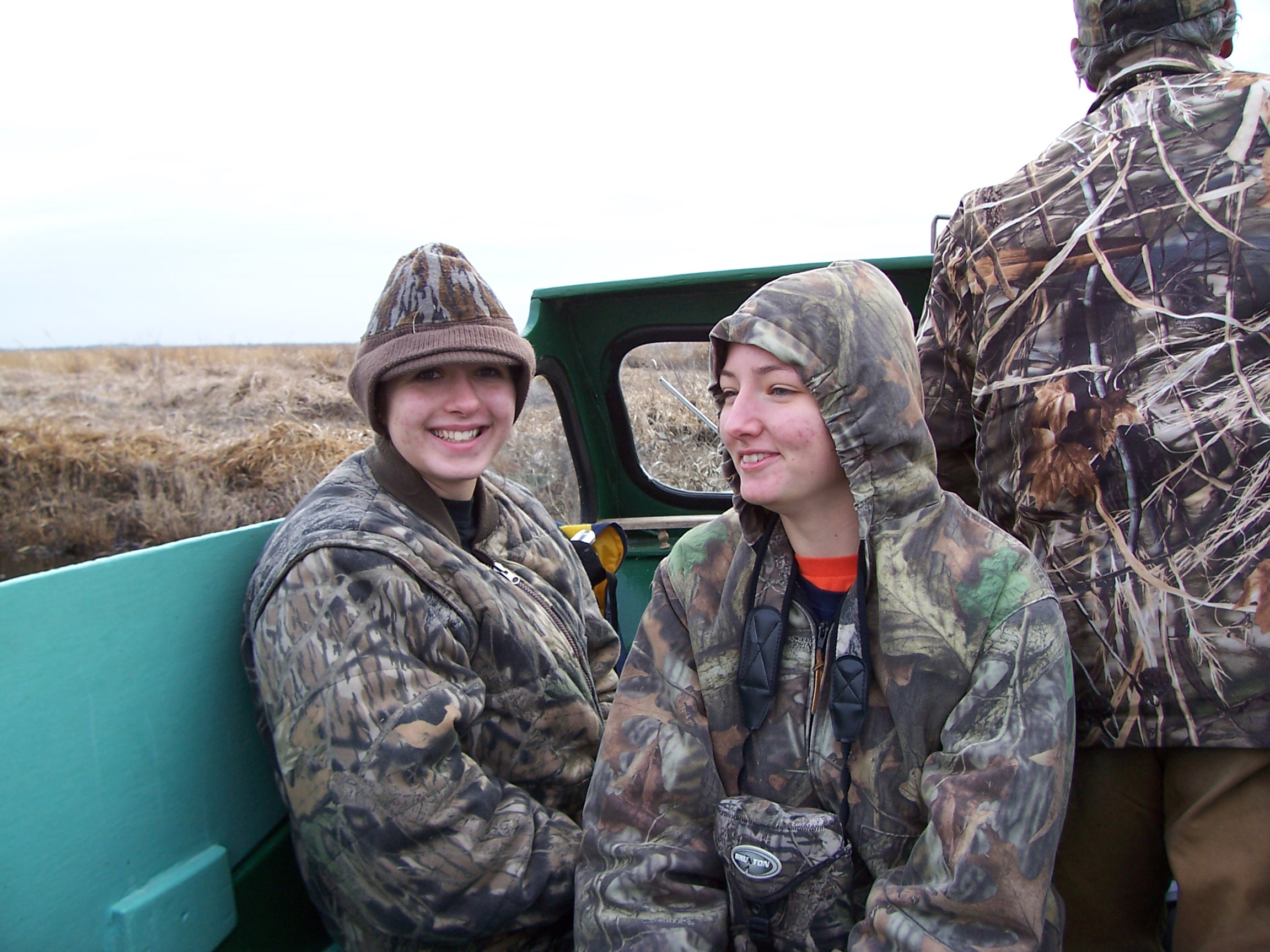 4-H'ers riding in mud boat at Marsh Maneuvers