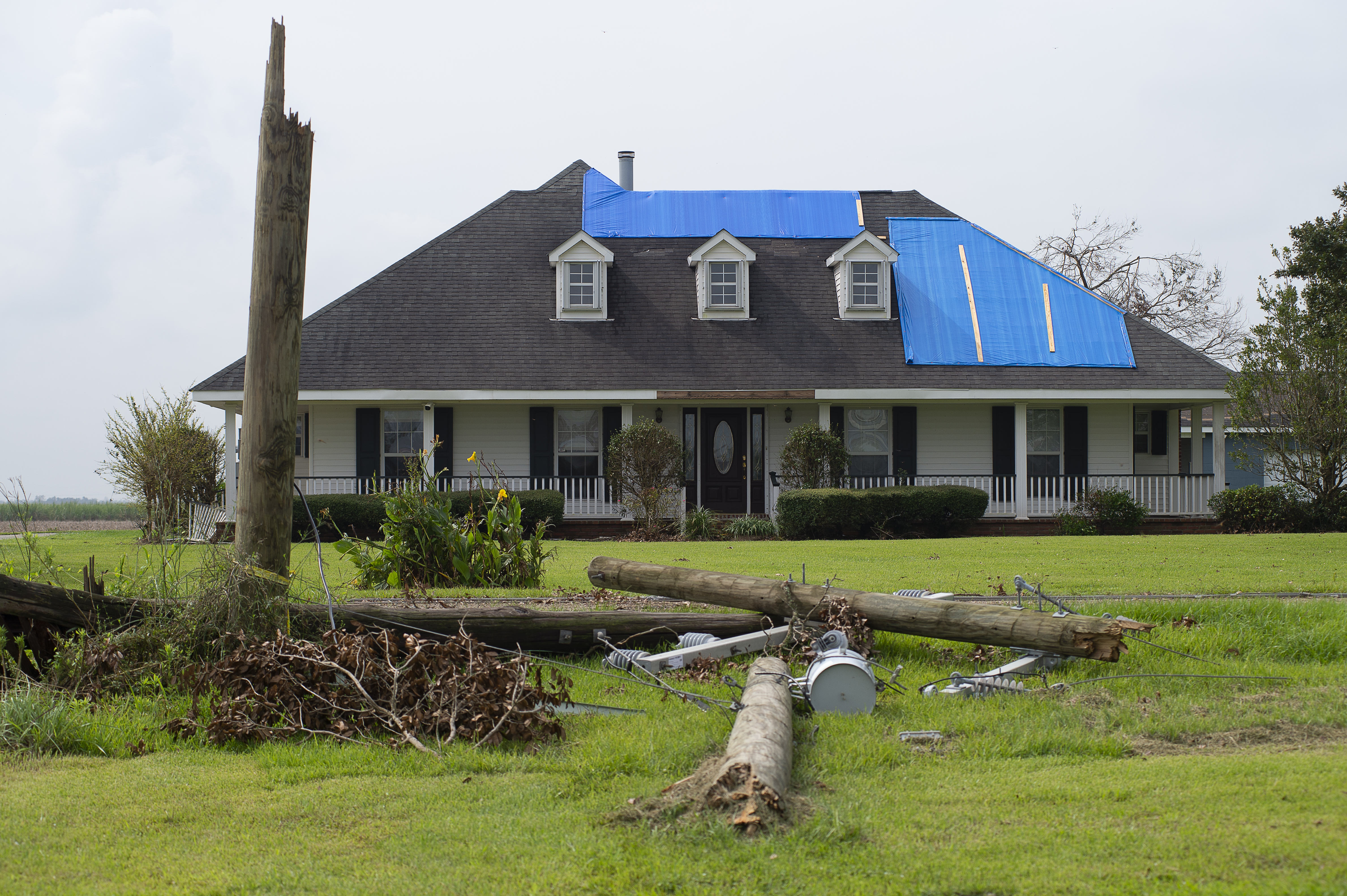 Got the blue tarp blues? Here’s how to get a hurricane-hardy roof  