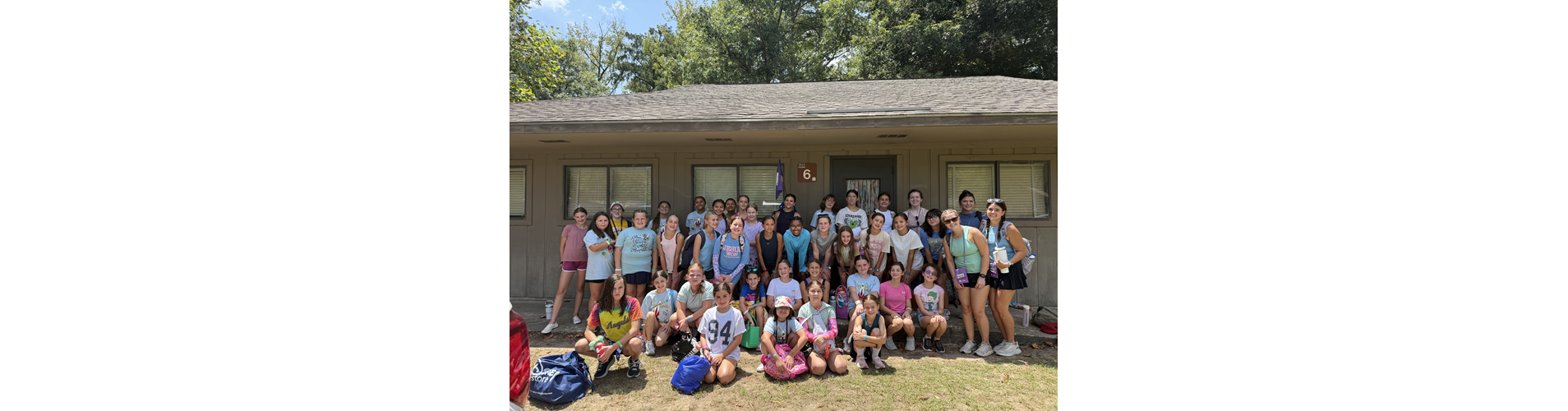Calcasieu Female Campers In front of their Cabin at Camp 