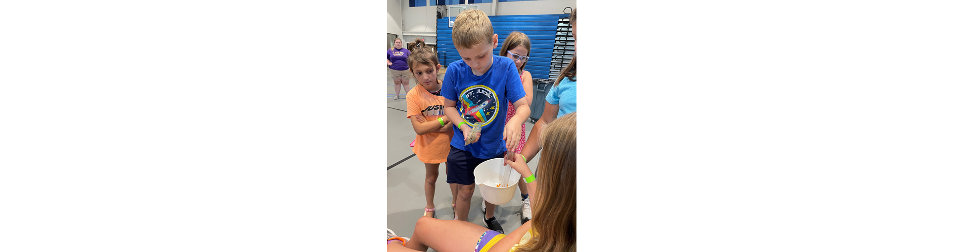 West Feliciana Parks & Rec camper Sawyer S. feeds his "intestine" during the Fiber Relay.