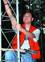 Zhenmin Tang