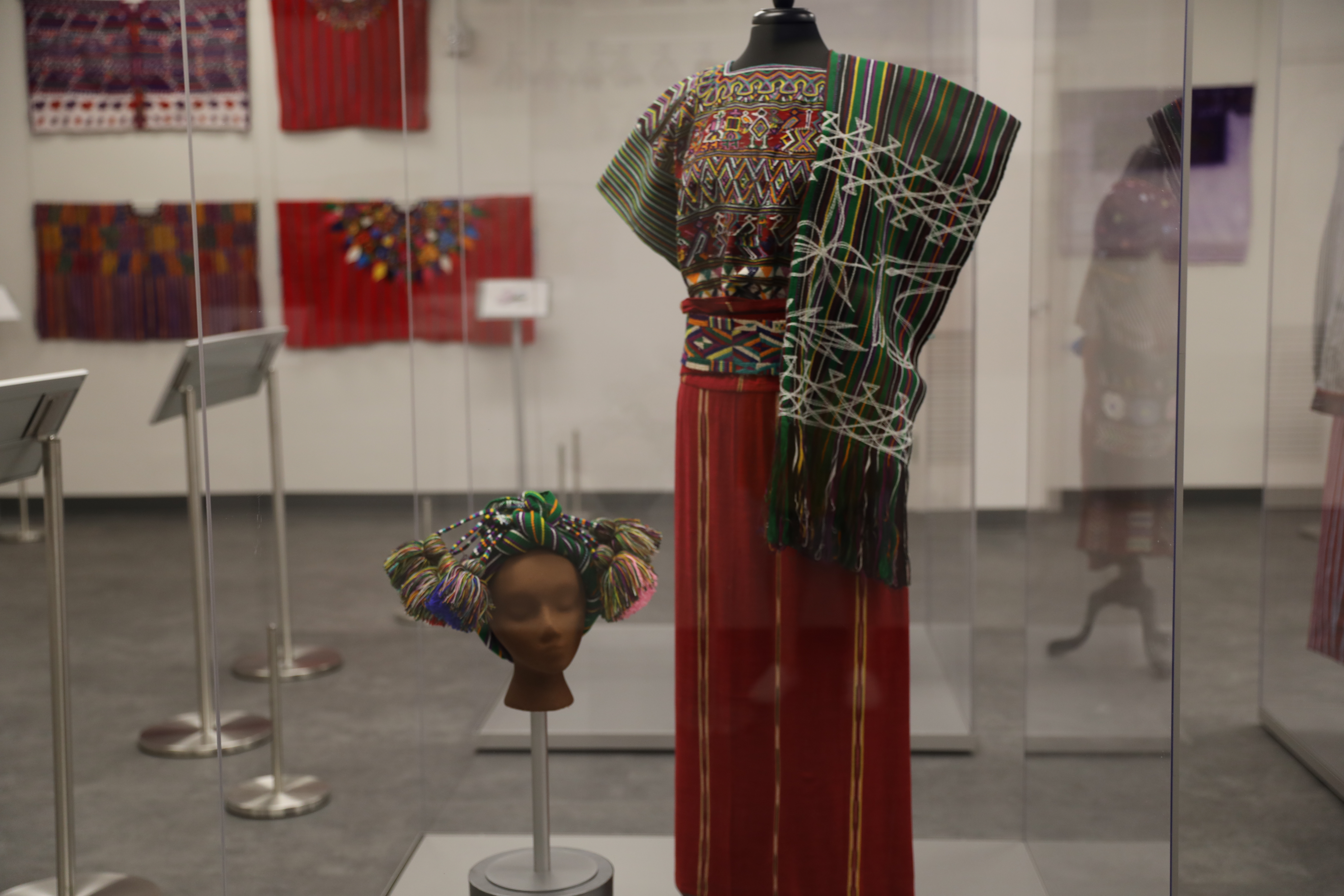 Guatemalan garments on display at the “Trajé, Maya Textile Artistry” exhibition at The LSU Textile and Costume Museum.