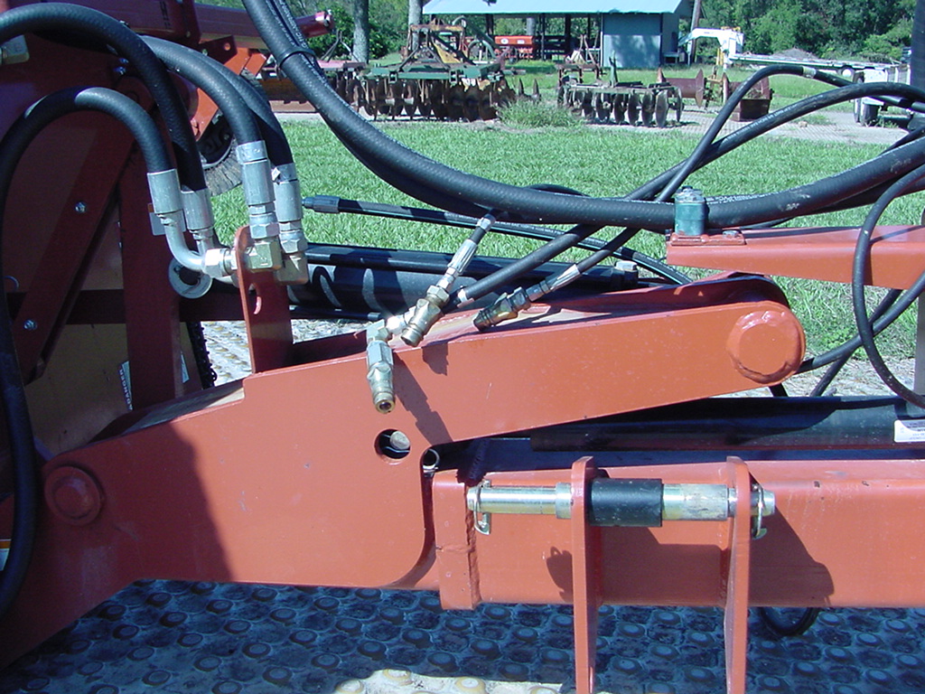 hang hydraulic lines to keep tips clean