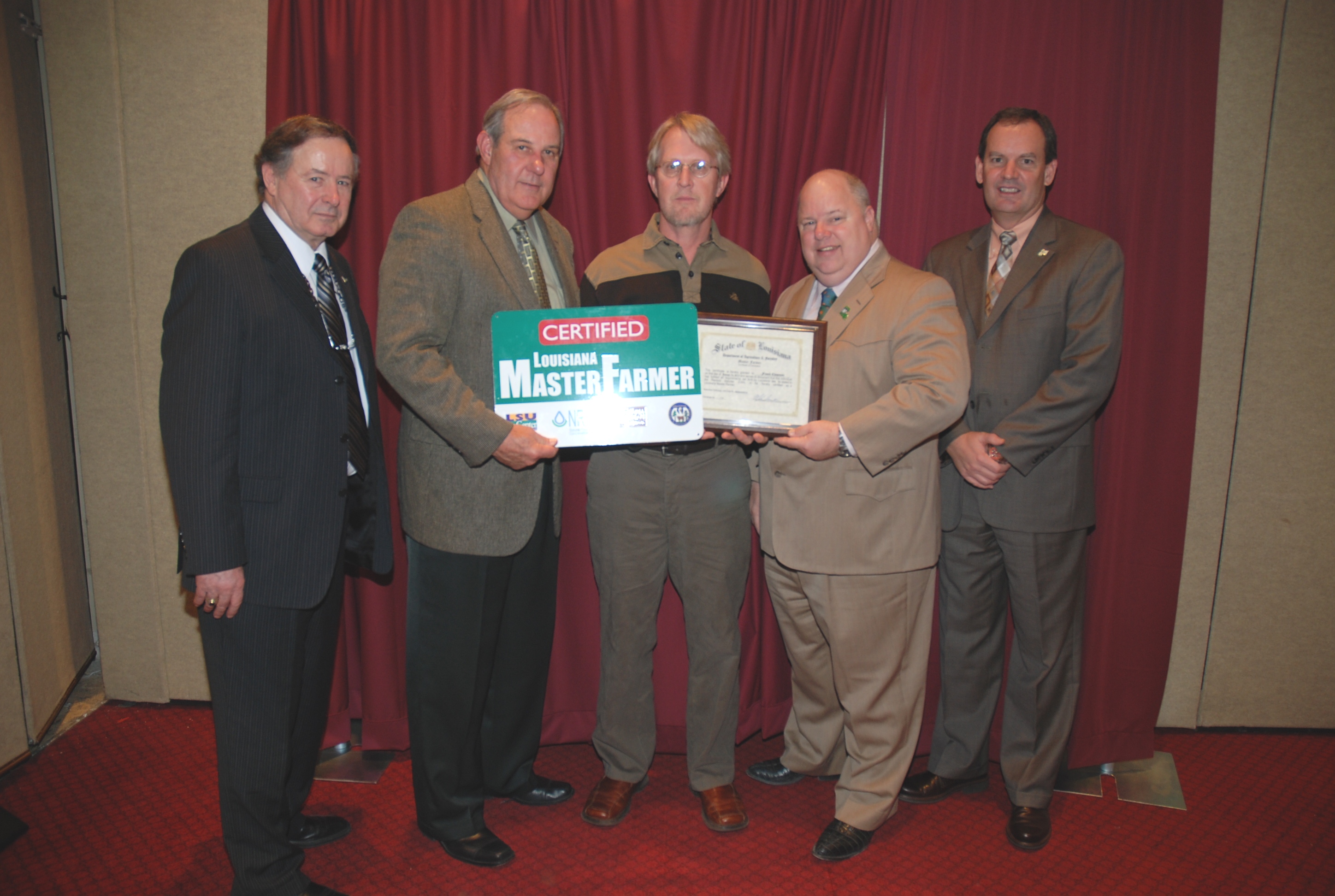 W. Frank Chapman (center), of DeRidder in Beauregard Parish