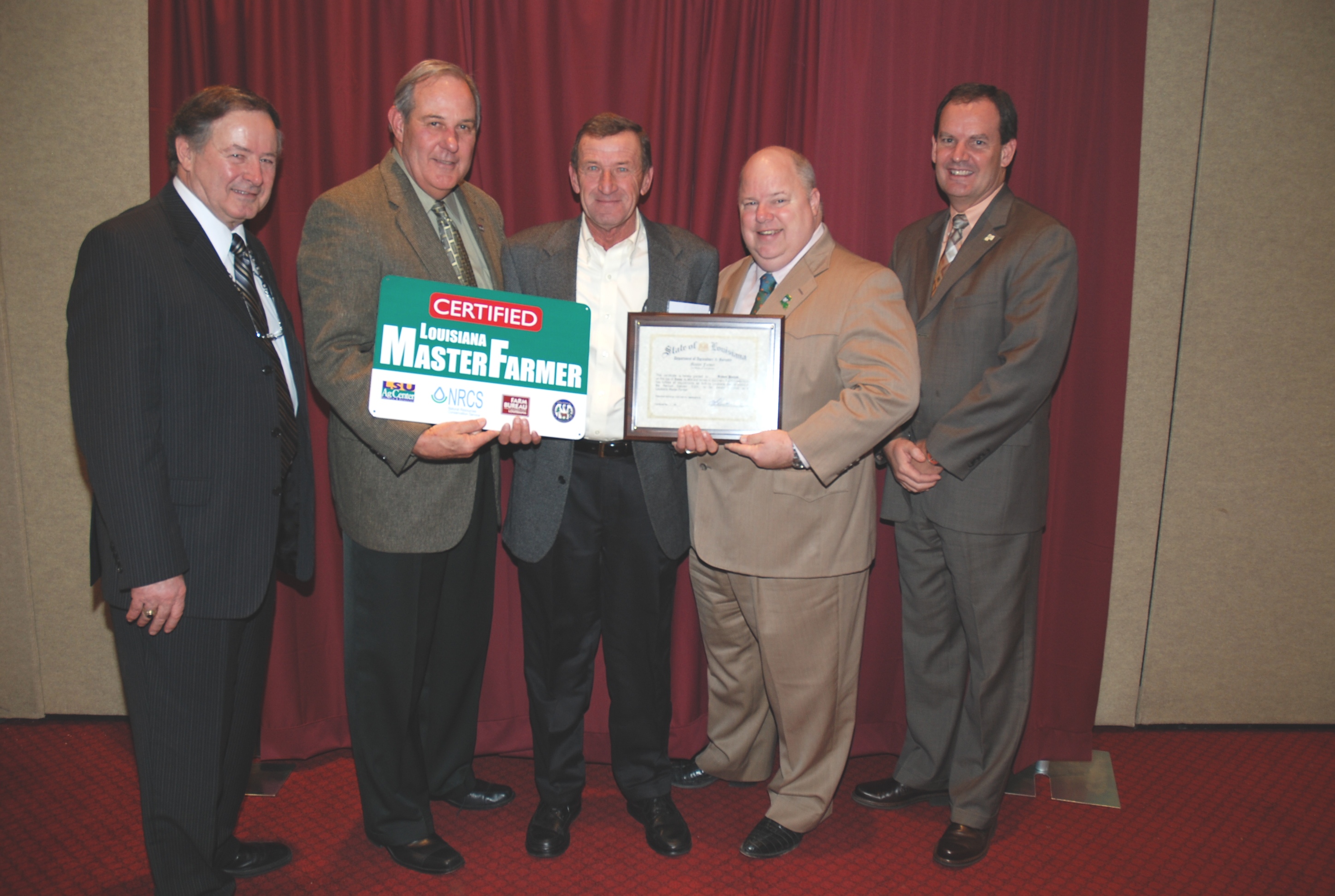 Rubin Dauzat (center), of Marksville in Avoyelles Parish