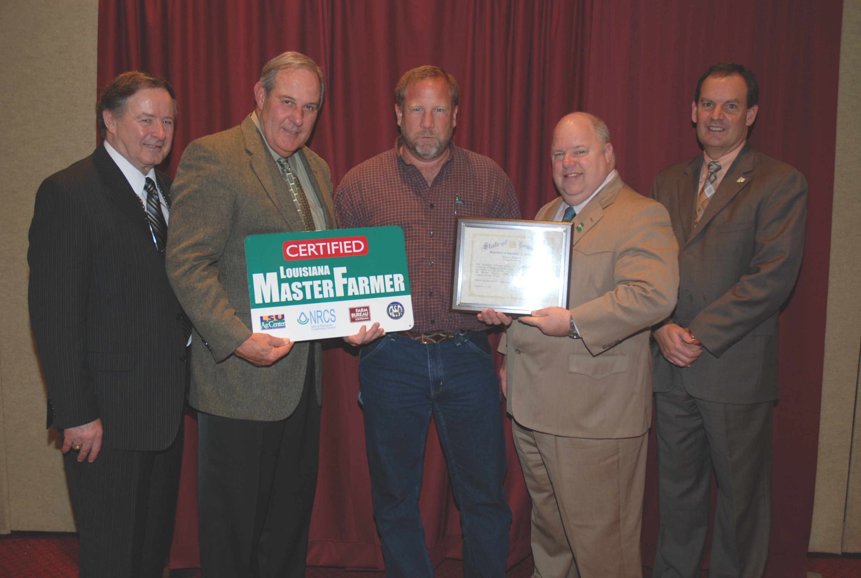 Conery Durand (center), of St Martinville in St Martin Parish