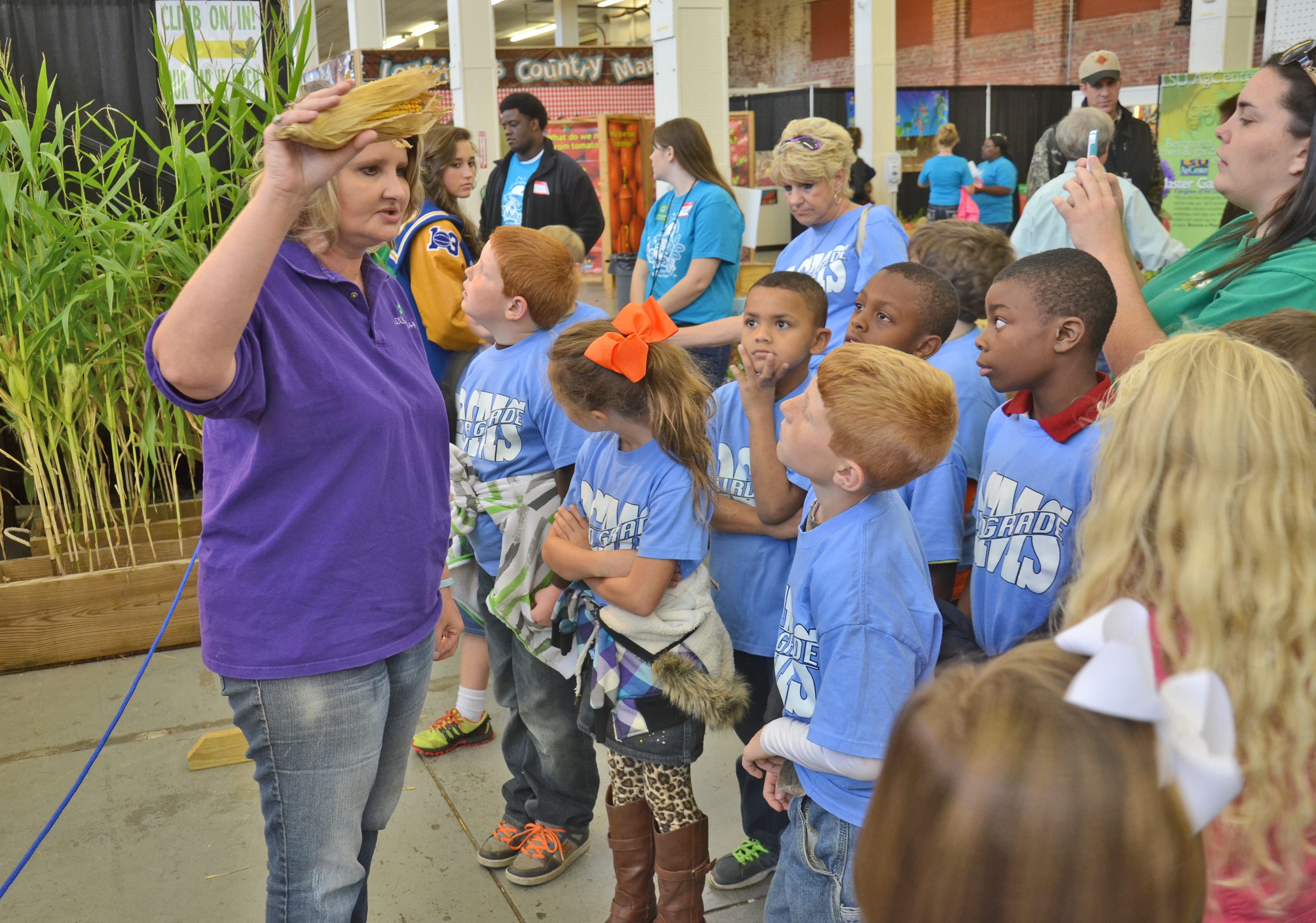 Students learn about agriculture at the State Fairs AgMagic