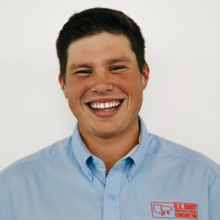 Head shot of smiling young man.