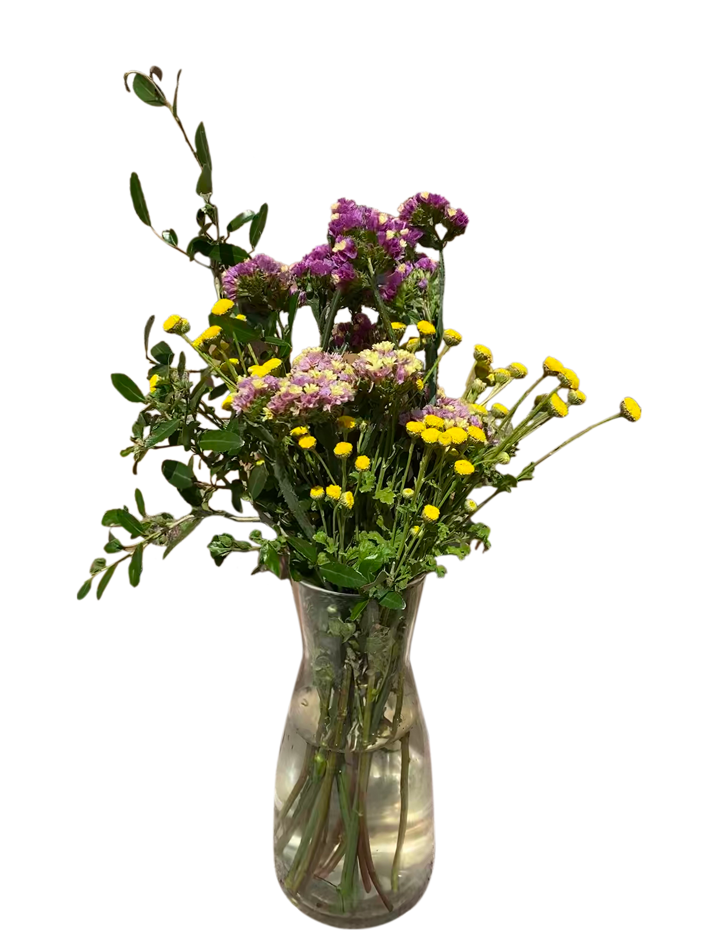 Bouquet of mixed flowers including statice in a glass vase.