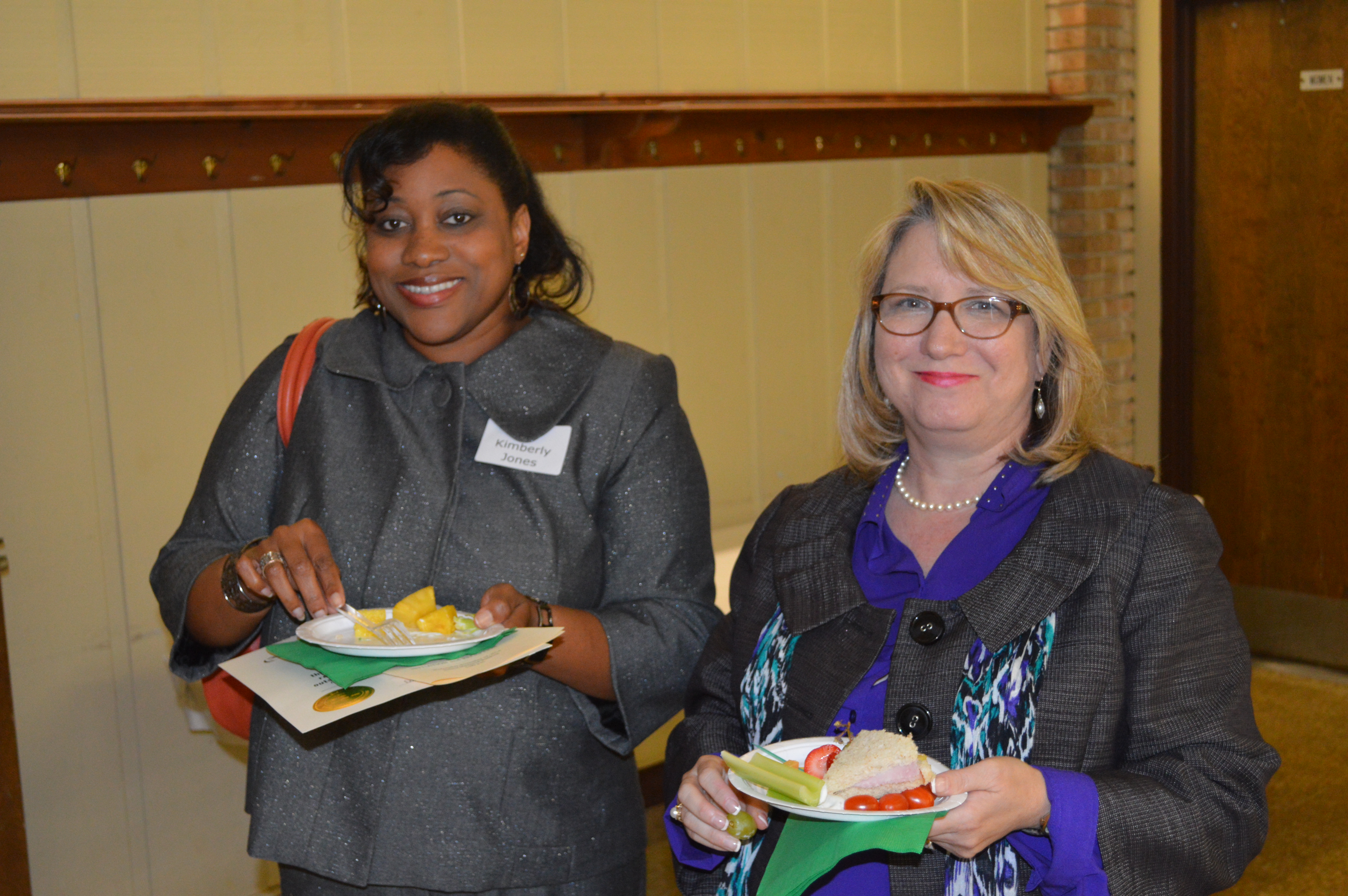 Kim Jones and Janet Fox enjoy refreshments served following the ceremony.