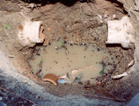 Remove section of sewer line.