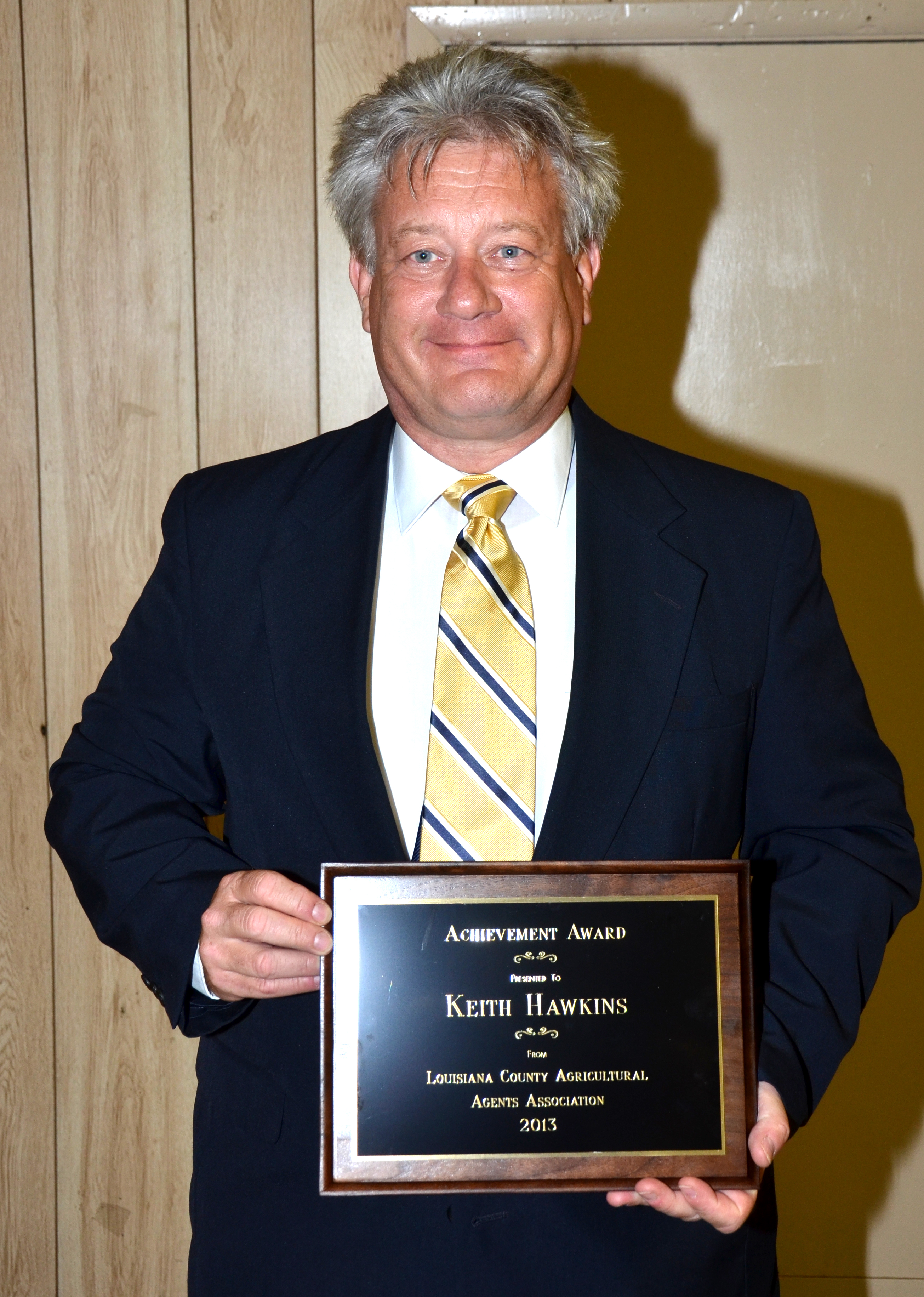 County agents honor two at state meeting