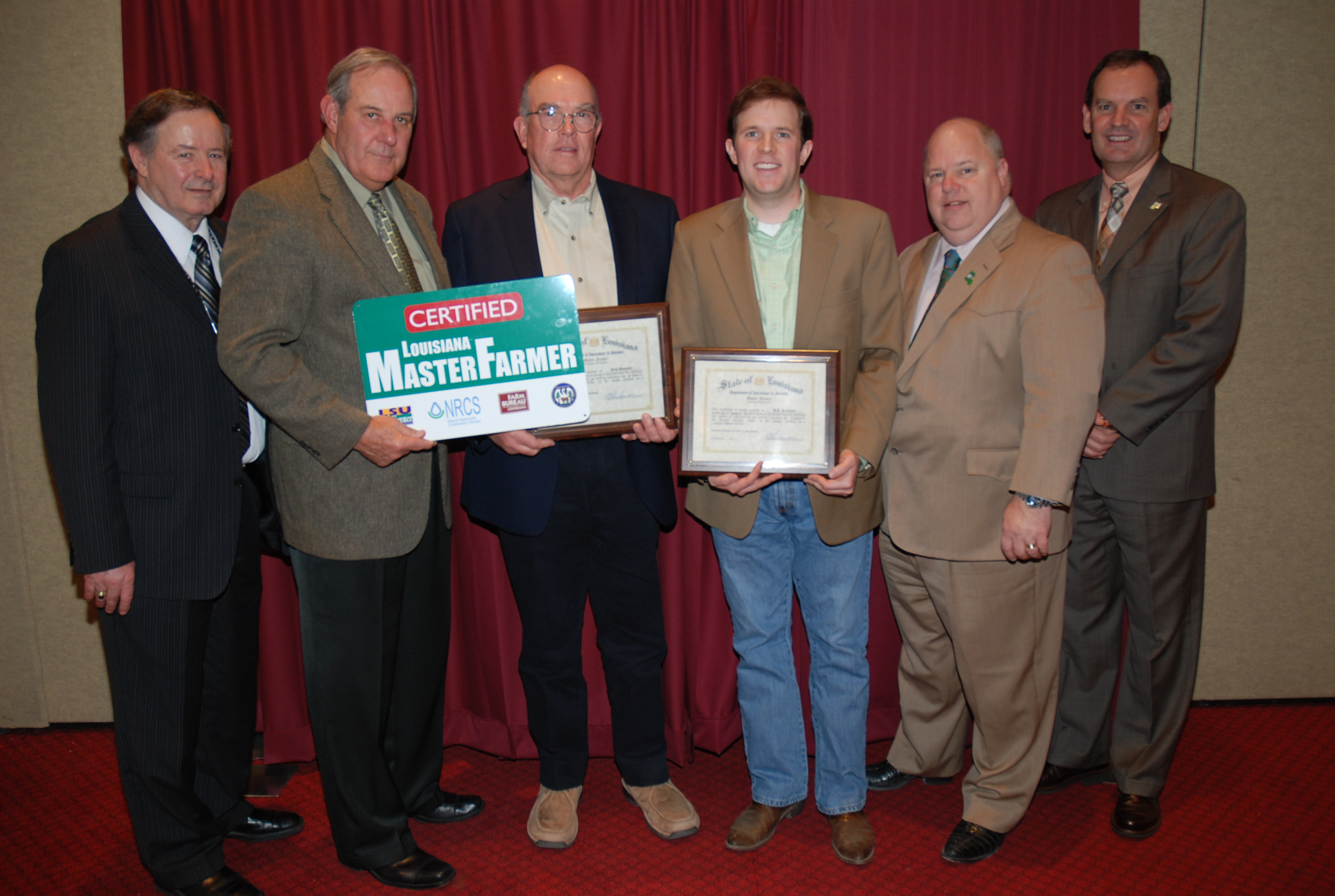J.A. Rummler and Jens Rummler (center), of Oscar in Pointe Coupee Parish