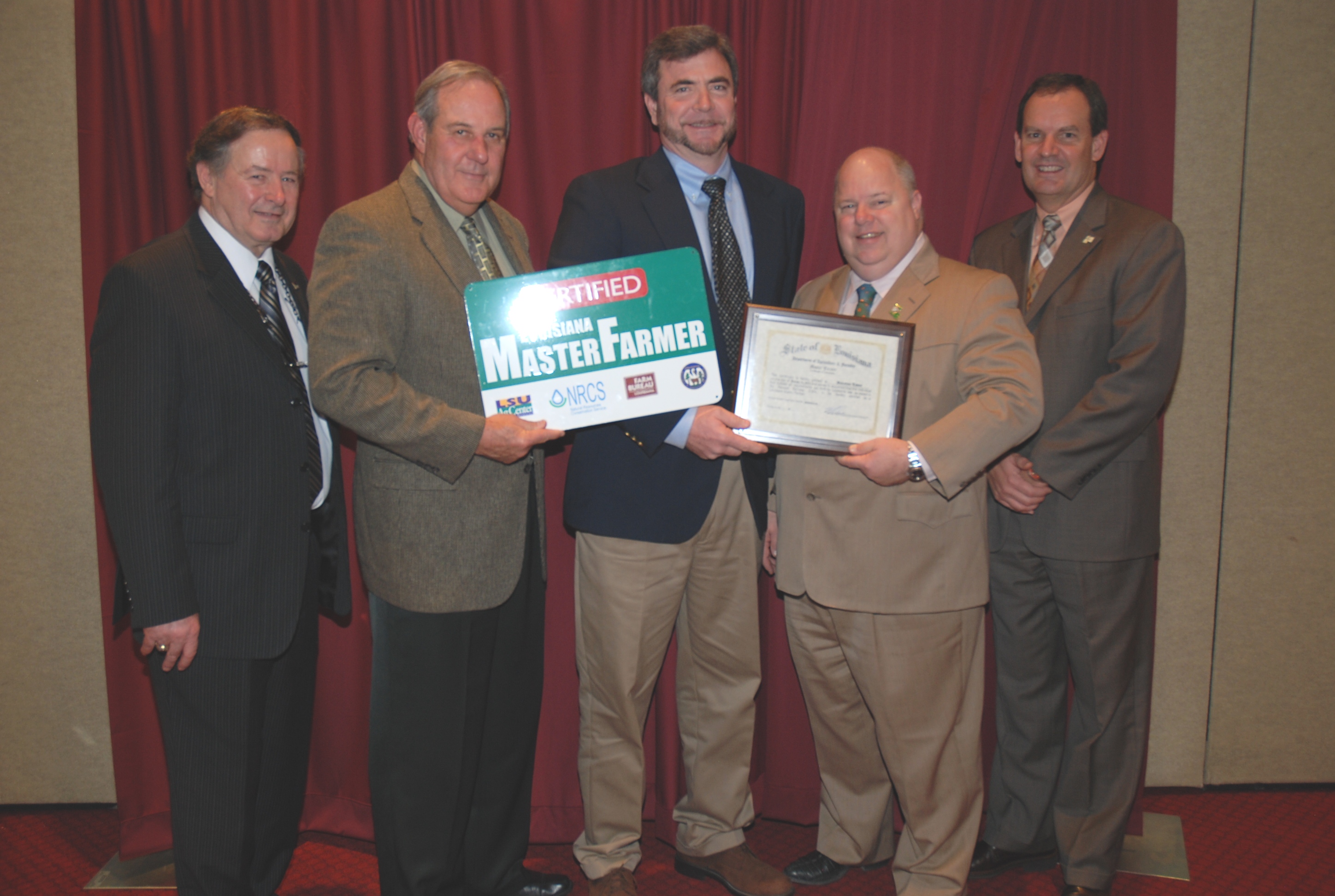 Donavon Taves (center), of Lake Providence in East Carroll Parish