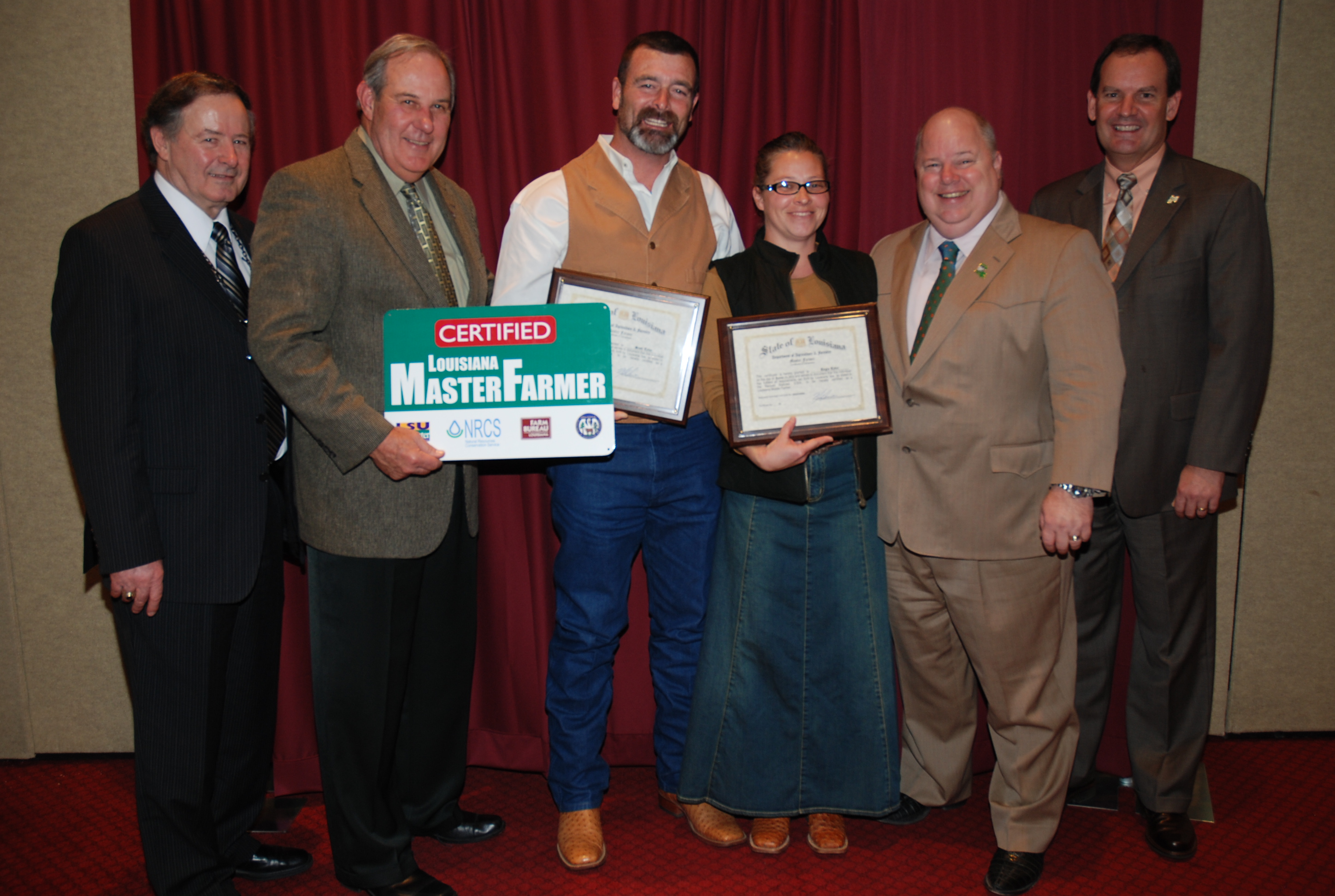 Scott and Angie Tyler (center), of Dubach in Lincoln Parish